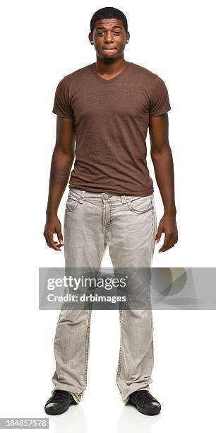 young man standing portrait - biting lip stock pictures, royalty-free photos & images