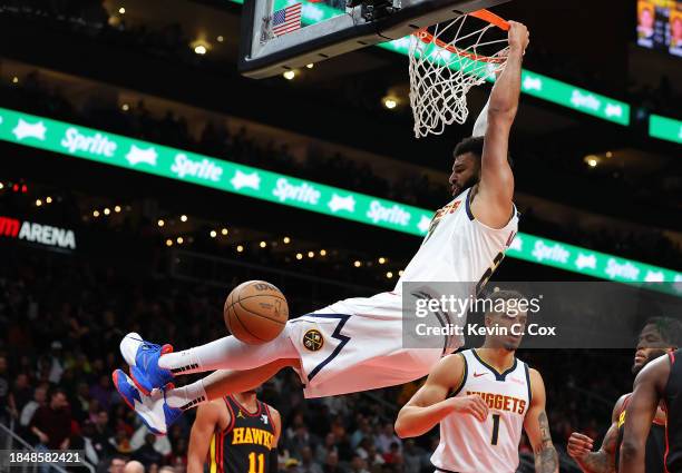 Jamal Murray of the Denver Nuggets dunks against the Atlanta Hawks during the second quarter at State Farm Arena on December 11, 2023 in Atlanta,...