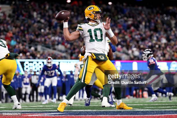 Jordan Love of the Green Bay Packers throws a pass against the New York Giants during the first quarter in the game at MetLife Stadium on December...