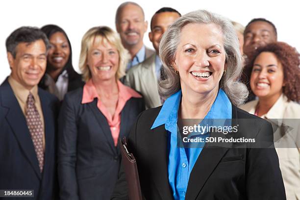 experienced business woman in front of peers - case manager stock pictures, royalty-free photos & images
