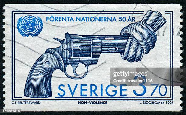 non-violence stamp - non violence stock pictures, royalty-free photos & images