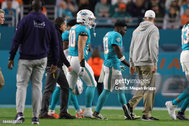 Tyreek Hill of the Miami Dolphins walks off the field in the first half against the Tennessee Titans at Hard Rock Stadium on December 11, 2023 in...