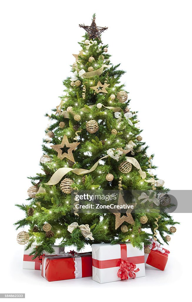 Christmas tree with lights and gifts isolated on white