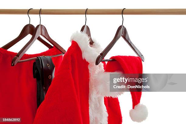 santa's closet - red coat stock pictures, royalty-free photos & images