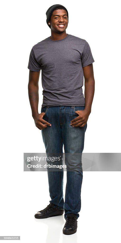 Standing smiling man wearing jeans and a t-shirt