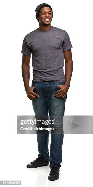 standing smiling man wearing jeans and a t-shirt - 19 years stock pictures, royalty-free photos & images