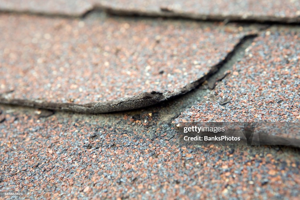 Verwitterte und beschädigte House Shingle
