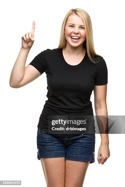 young woman makes number one gesture - woman index finger stock pictures, royalty-free photos & images