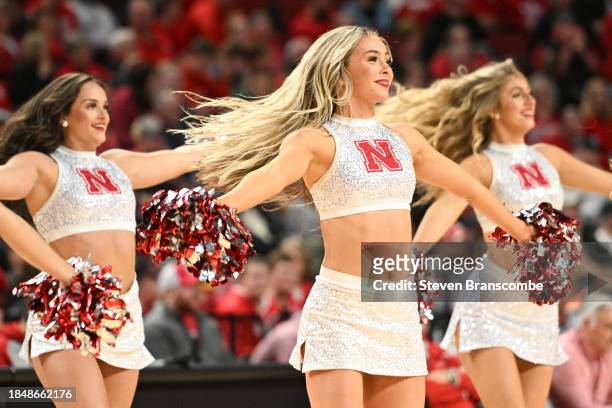 Cheerleaders for the Nebraska Cornhuskers perform during a break in the game against the Michigan State Spartans in the second half at Pinnacle Bank...