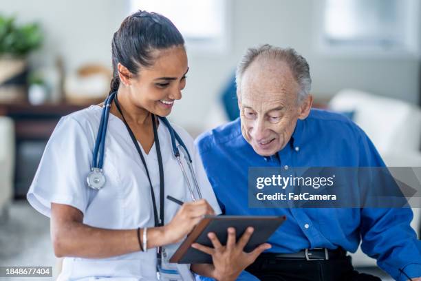 homecare visit - medicaid stock pictures, royalty-free photos & images