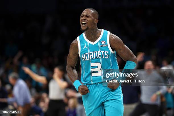 Terry Rozier of the Charlotte Hornets reacts following a three point basket during the second half of their game against the Miami Heat at Spectrum...