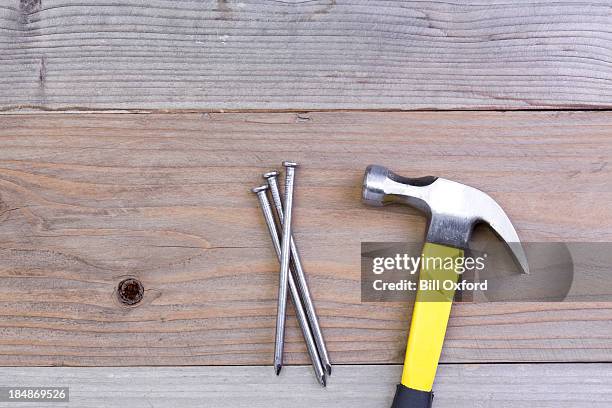 hammer and nails - metal hammer stock pictures, royalty-free photos & images