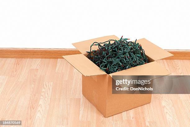 box of christmas lights - tangled christmas lights stock pictures, royalty-free photos & images