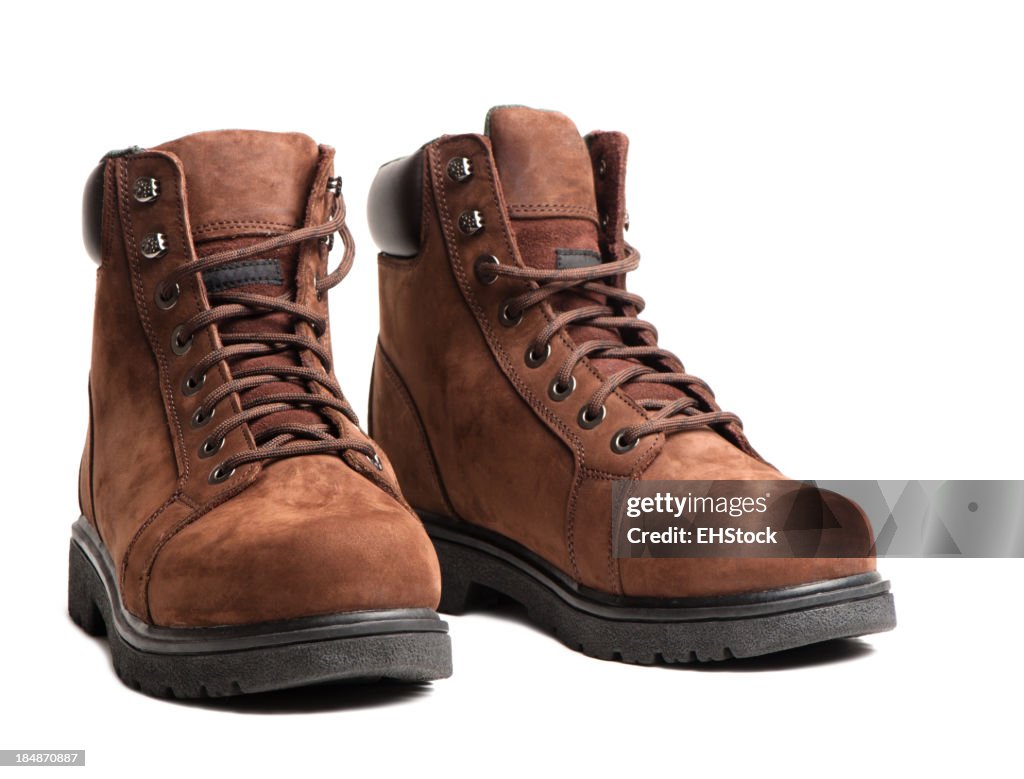 Botas de trabalho isolado em fundo branco