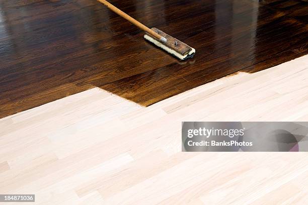 dark stain application on new oak hardwood floor - floorboard 個照片及圖片檔