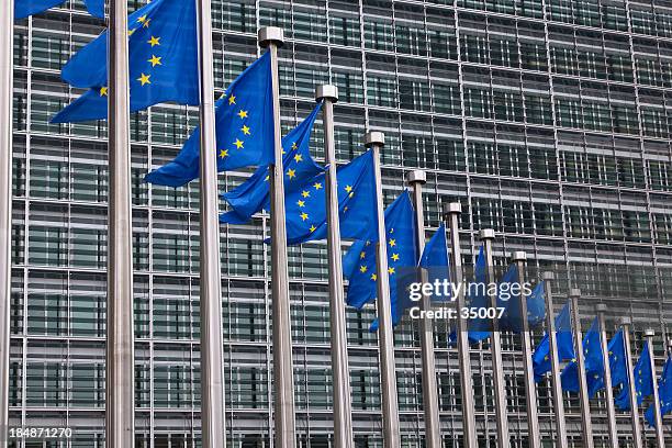 european union flags in brussels - berlaymont stock pictures, royalty-free photos & images