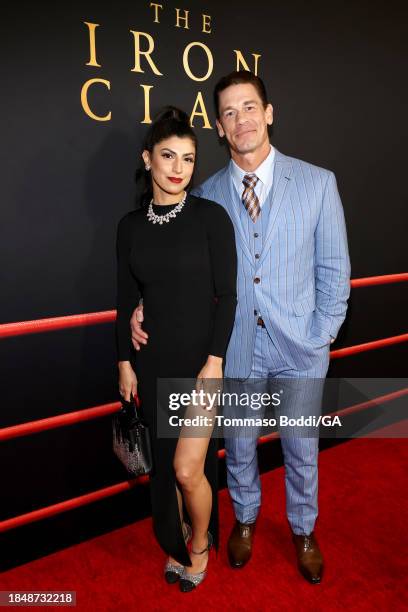 Shay Shariatzadeh and John Cena attend the Los Angeles Premiere Of A24's "The Iron Claw" at DGA Theater Complex on December 11, 2023 in Los Angeles,...