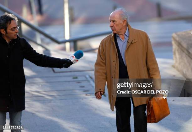 Former IMF chief, former Spanish Economy Minister and former president of Caja Madrid bank Rodrigo Rato, accused of tax evasion and corruption, walks...