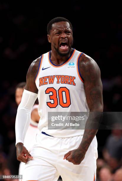 Julius Randle of the New York Knicks celebrates scoring against the Toronto Raptors during their game at Madison Square Garden on December 11, 2023...