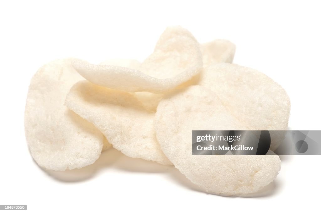 Prawn crackers crisps on white