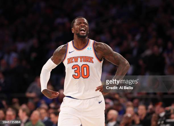 Julius Randle of the New York Knicks celebrates scoring against the Toronto Raptors during their game at Madison Square Garden on December 11, 2023...