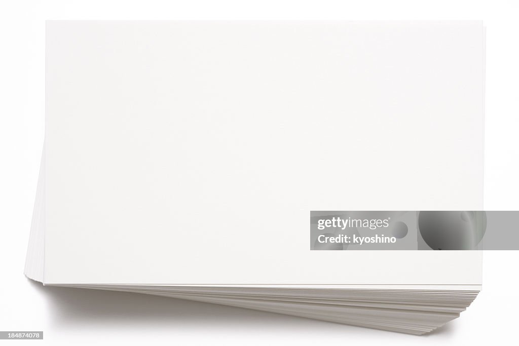 Isolated shot of stacked blank white cards on white background