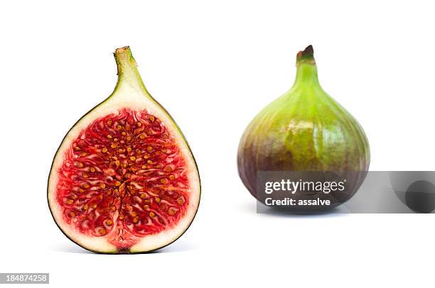 bisected and whole fig fruit isolated on white - bisected 個照片及圖片檔