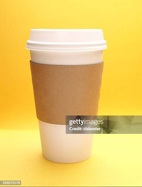 paper coffee cup w/plain cozy - coffee cup disposable stock pictures, royalty-free photos & images