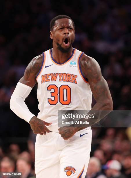 Julius Randle of the New York Knicks celebrates scoring against the Toronto Raptors during their game at Madison Square Garden on December 11, 2023...