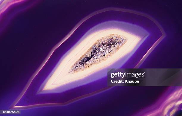 quartz crystal inside of purple banded agate - semi precious gem stock pictures, royalty-free photos & images