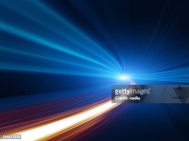 abstract speed motion in tunnel - dividing line stockfoto's en -beelden
