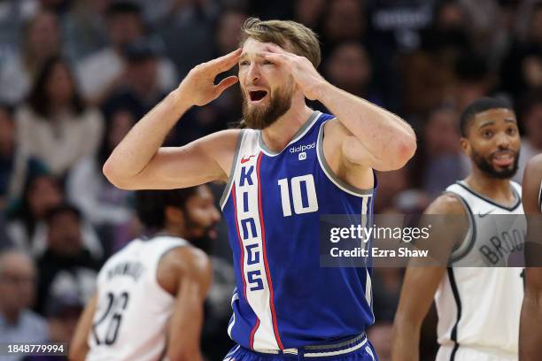 Domantas Sabonis of the Sacramento Kings complains about a call during their game against the Brooklyn Nets in the first half at Golden 1 Center on...