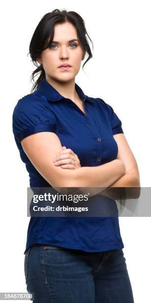 serious young woman crosses arms - blue blouse stock pictures, royalty-free photos & images