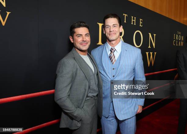 Zac Efron and John Cena attend the Los Angeles Premiere of A24's "The Iron Claw" at Directors Guild Of America on December 11, 2023 in Los Angeles,...
