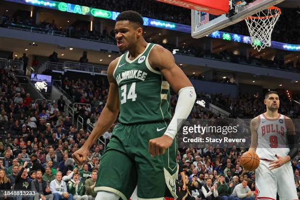 Giannis Antetokounmpo of the Milwaukee Bucks reacts to a score during the second half of a game against the Chicago Bulls at Fiserv Forum on December...