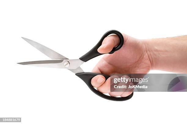 hand holding scissors - cut on finger stock pictures, royalty-free photos & images