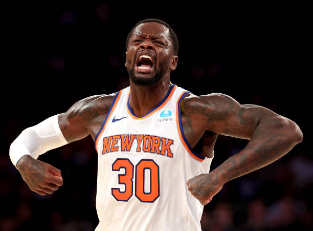 Julius Randle of the New York Knicks celebrates scoring against the Toronto Raptors during their game at Madison Square Garden on December 11, 2023...