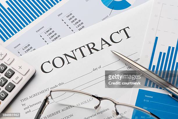 close-up image of contract form on a desk - contract stock pictures, royalty-free photos & images