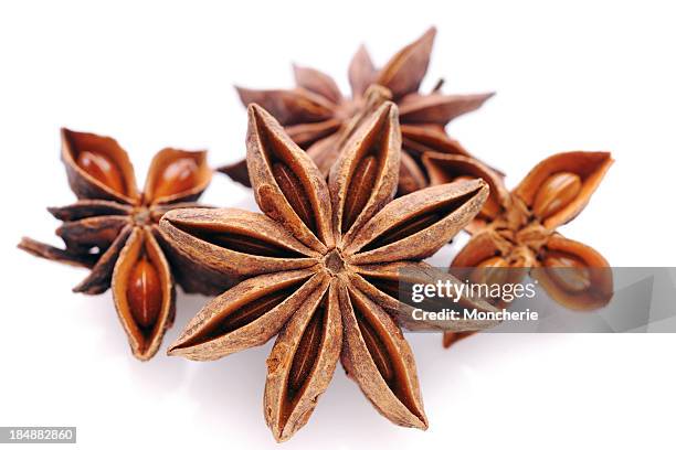 star anise on white - star anise stock pictures, royalty-free photos & images