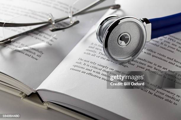 medical research - studying literature stock pictures, royalty-free photos & images