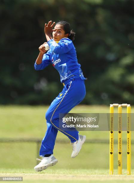 Jannatul Sumona of the ACT bowls during the WNCL match between ACT and Queensland at EPC Solar Park, on December 12 in Canberra, Australia.