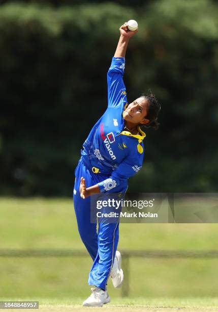 Jannatul Sumona of the ACT bowls during the WNCL match between ACT and Queensland at EPC Solar Park, on December 12 in Canberra, Australia.