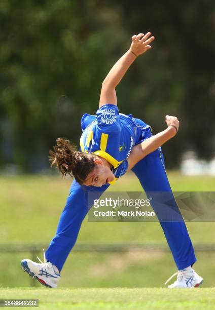 Amy Hunter of the ACT bowls during the WNCL match between ACT and Queensland at EPC Solar Park, on December 12 in Canberra, Australia.