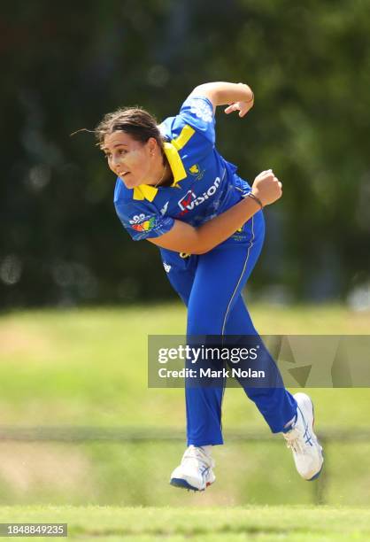 Amy Hunter of the ACT bowls during the WNCL match between ACT and Queensland at EPC Solar Park, on December 12 in Canberra, Australia.