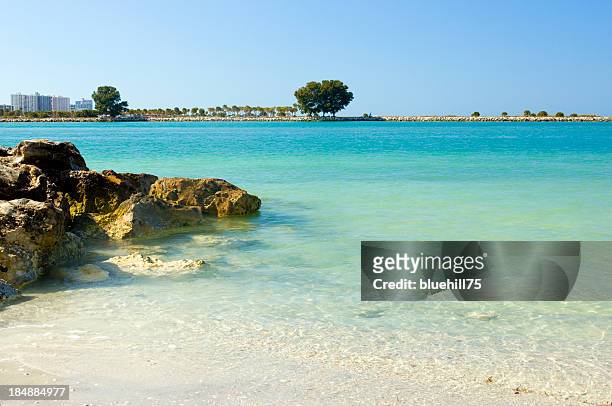a view of a clear beach during a summer vacation - clearwater stock pictures, royalty-free photos & images