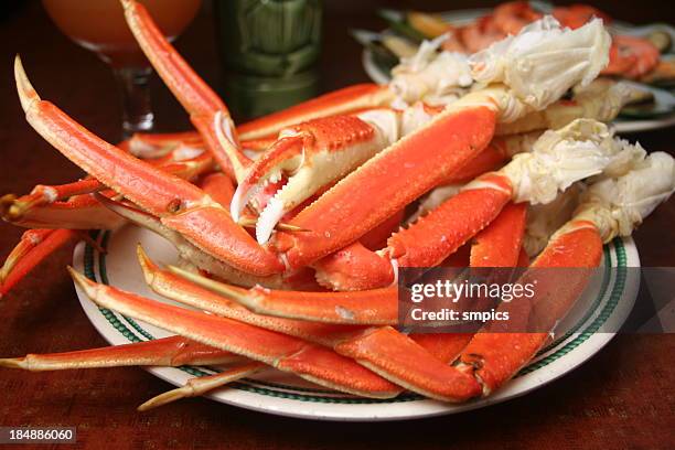 king crab legs - crab legs stock pictures, royalty-free photos & images