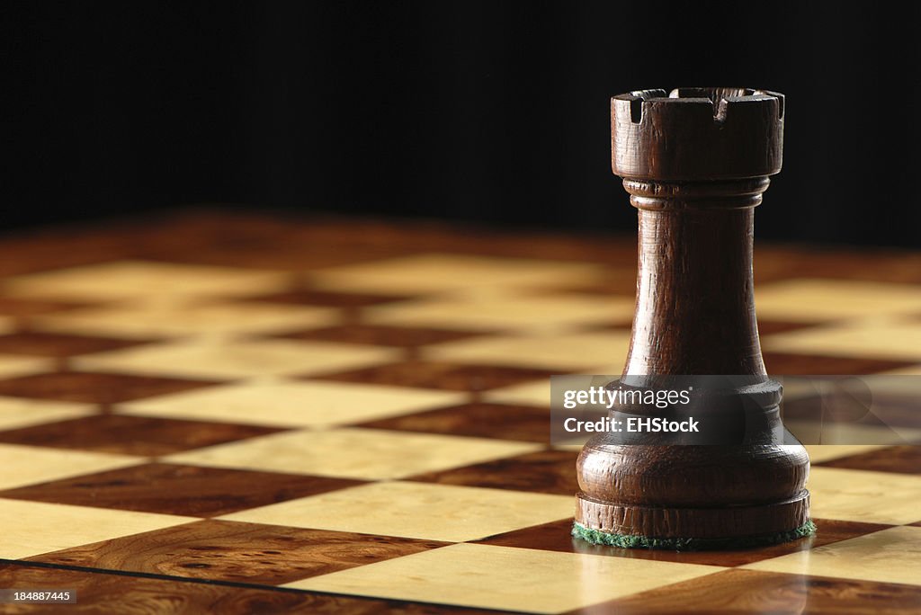 Black Rook on Chessboard