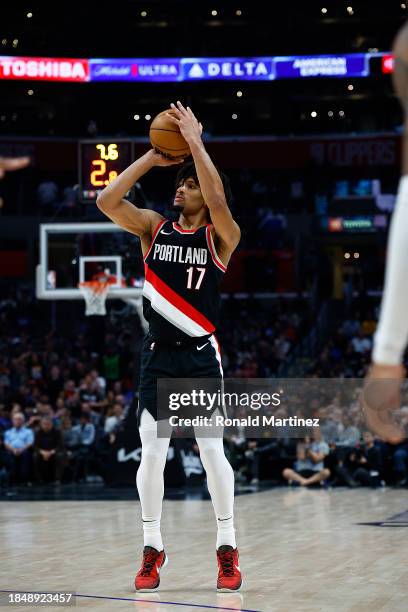 Shaedon Sharpe of the Portland Trail Blazers makes a three-point shot against the LA Clippers in the second half at Crypto.com Arena on December 11,...