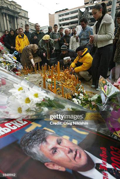 People light candles in front of a government building for assassinated Serbian Prime Minister Zoran Djindjic March 14, 2003 in the Serbian capitol...