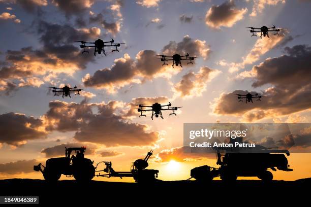 agricultural machinery and drones. modern farming - sembrar fotografías e imágenes de stock